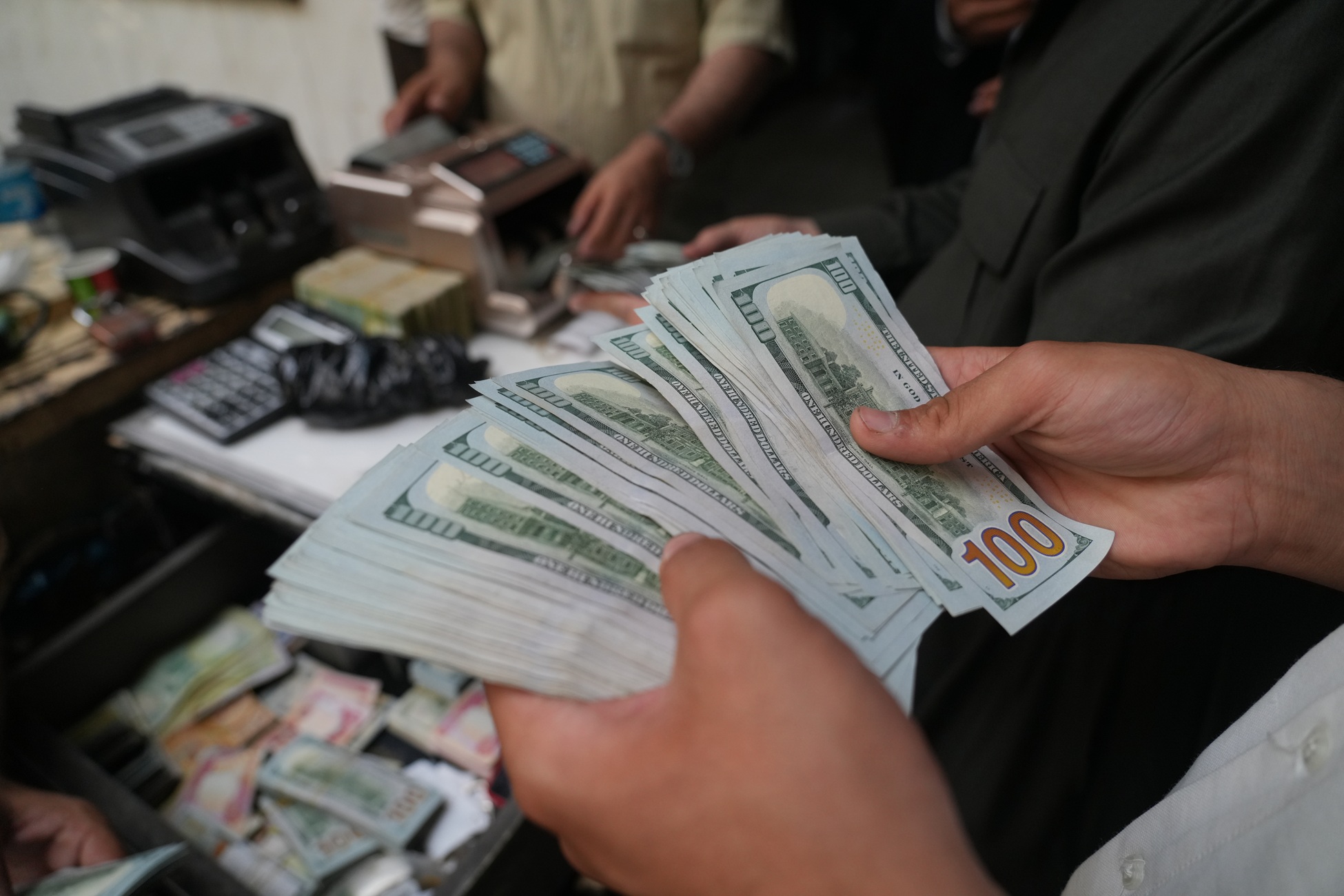 بازاڕى دۆلارەکەى سلێمانى فۆتۆ؛ حەمە سوور