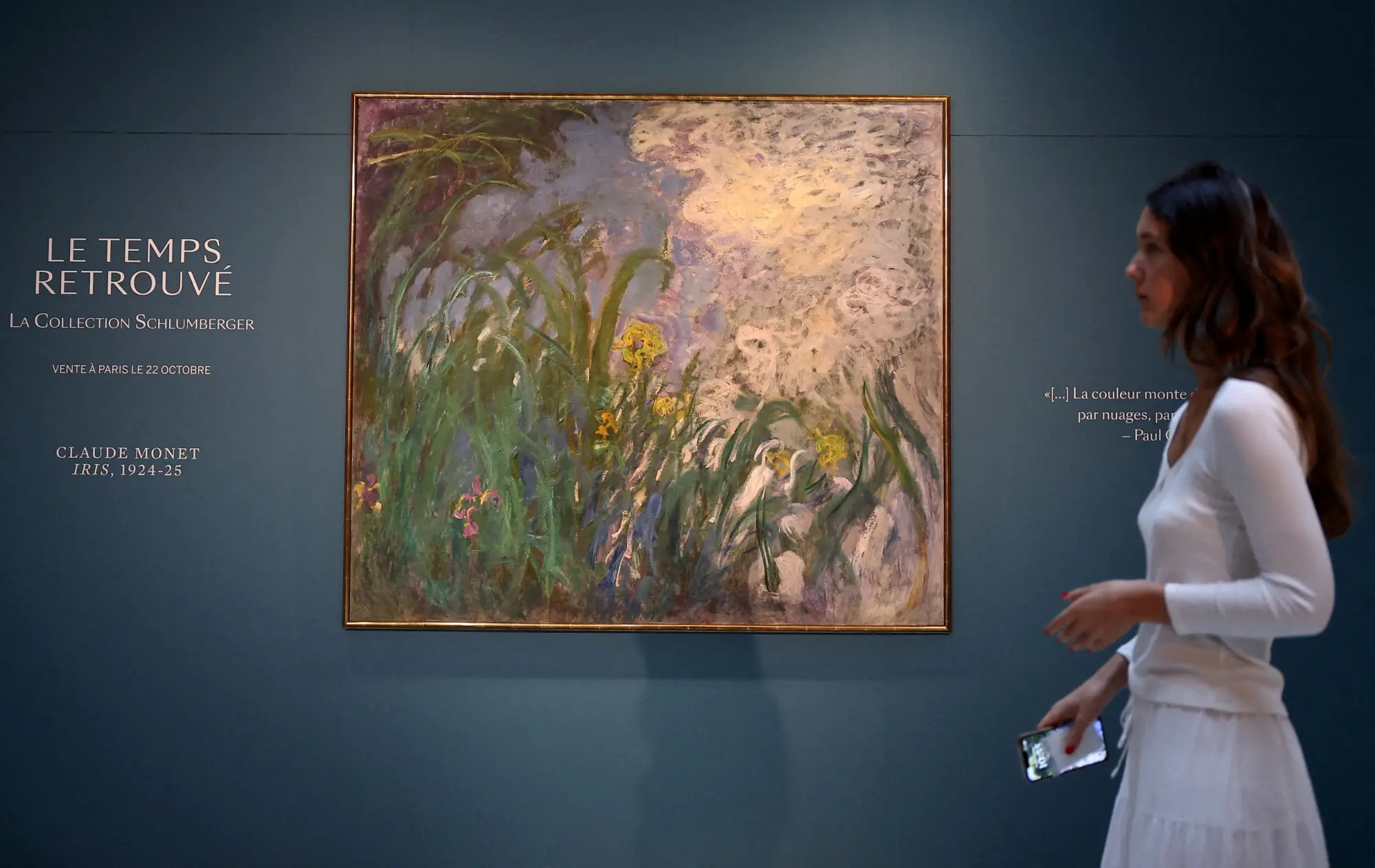 FILE PHOTO: A visitor walks past the painting