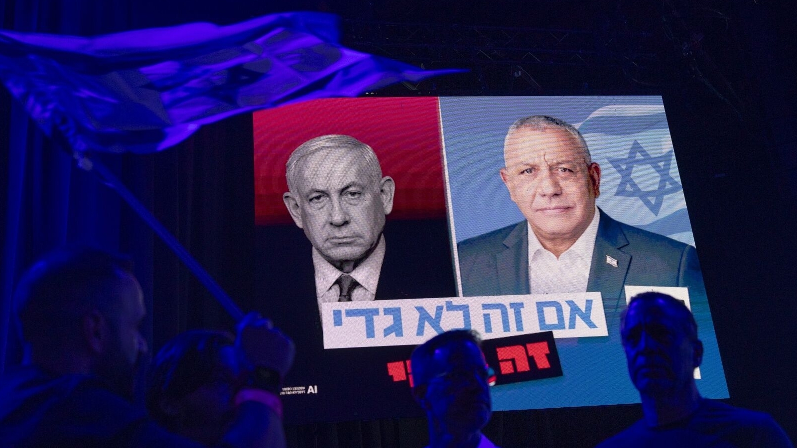 Images of Israeli Prime Minister Benjamin Netanyahu and Gadi Eisenkot, leader of Yashar, displayed on screens during a final election campaign rally in Tel Aviv, Israel, on Sunday, Oct. 25. Israel is gearing up for an election on Oct. 27 that will effectively be a referendum on Benjamin Netanyahu, the country’s longest-serving prime minister. Photographer: Kobi Wolf/Bloomberg