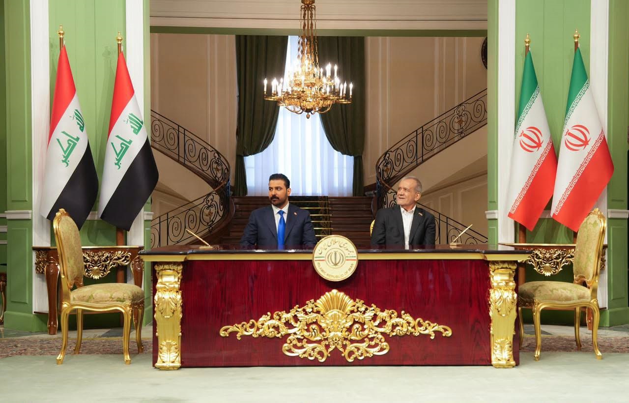 Iraqi Prime Minister Ali Faleh al-Zaidi and Iranian President Masoud Pezeshkian sign four bilateral agreements in Tehran on July 23, 2026. Photo: Iraqi PM Media Office