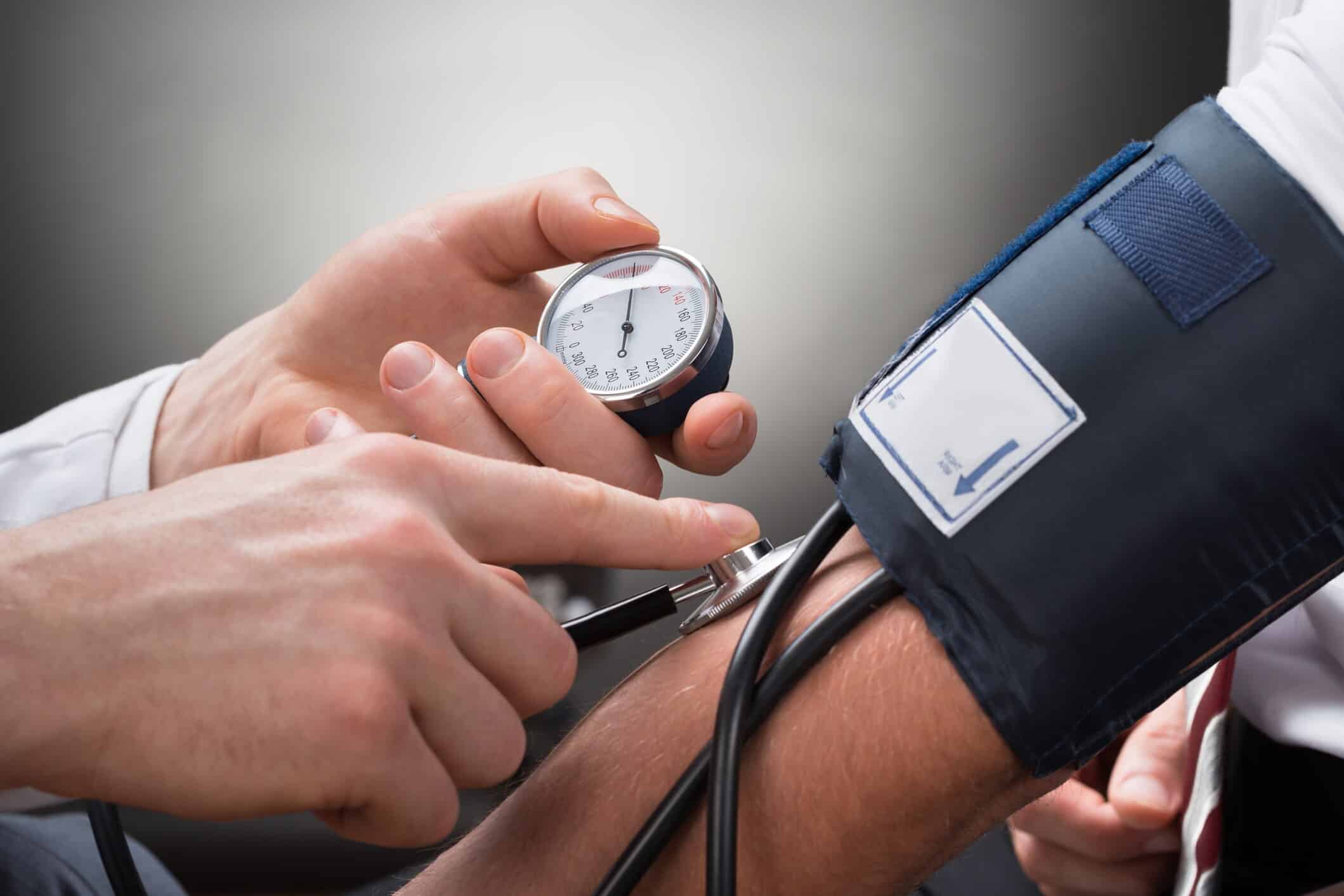 A photo of a blood pressure check being performed