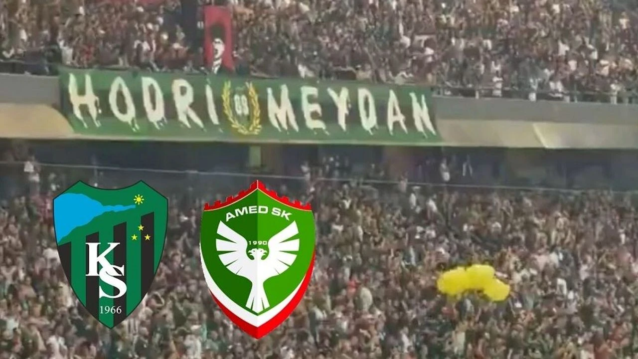 Kocaelispor fans hold up yellow plastic bags as a provocative anti-Kurdish symbol during a match against Amedspor at Kocaeli Stadium, beneath the banner of the home team's supporter group, Hodri Meydan.