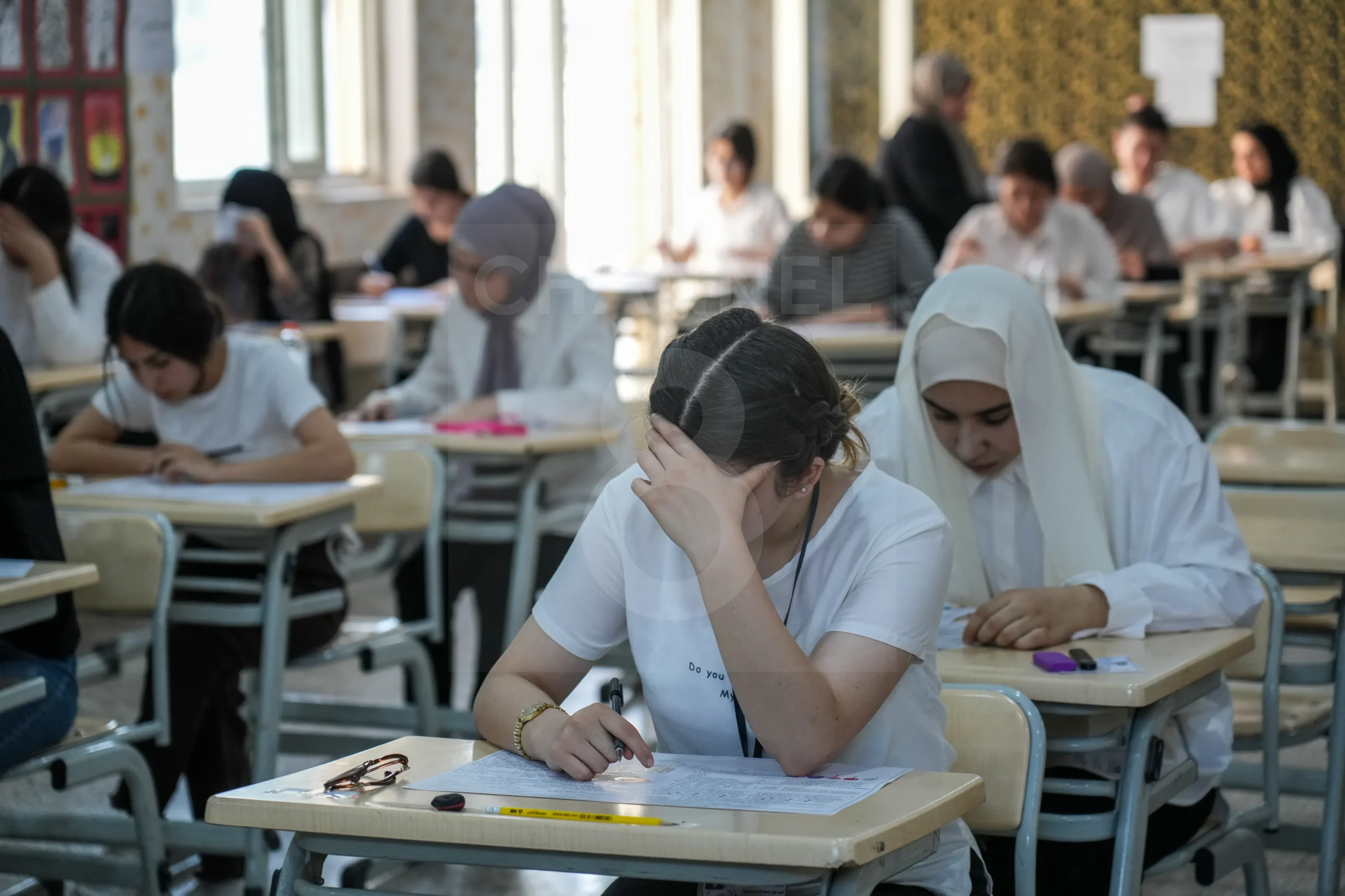 یەکێک لە هۆڵەکانی تاقیکردنەوەی خوێندکارانی قۆناغی 12ـی ئامادەیی. فۆتۆ:  حەمەسوور - کەناڵ8